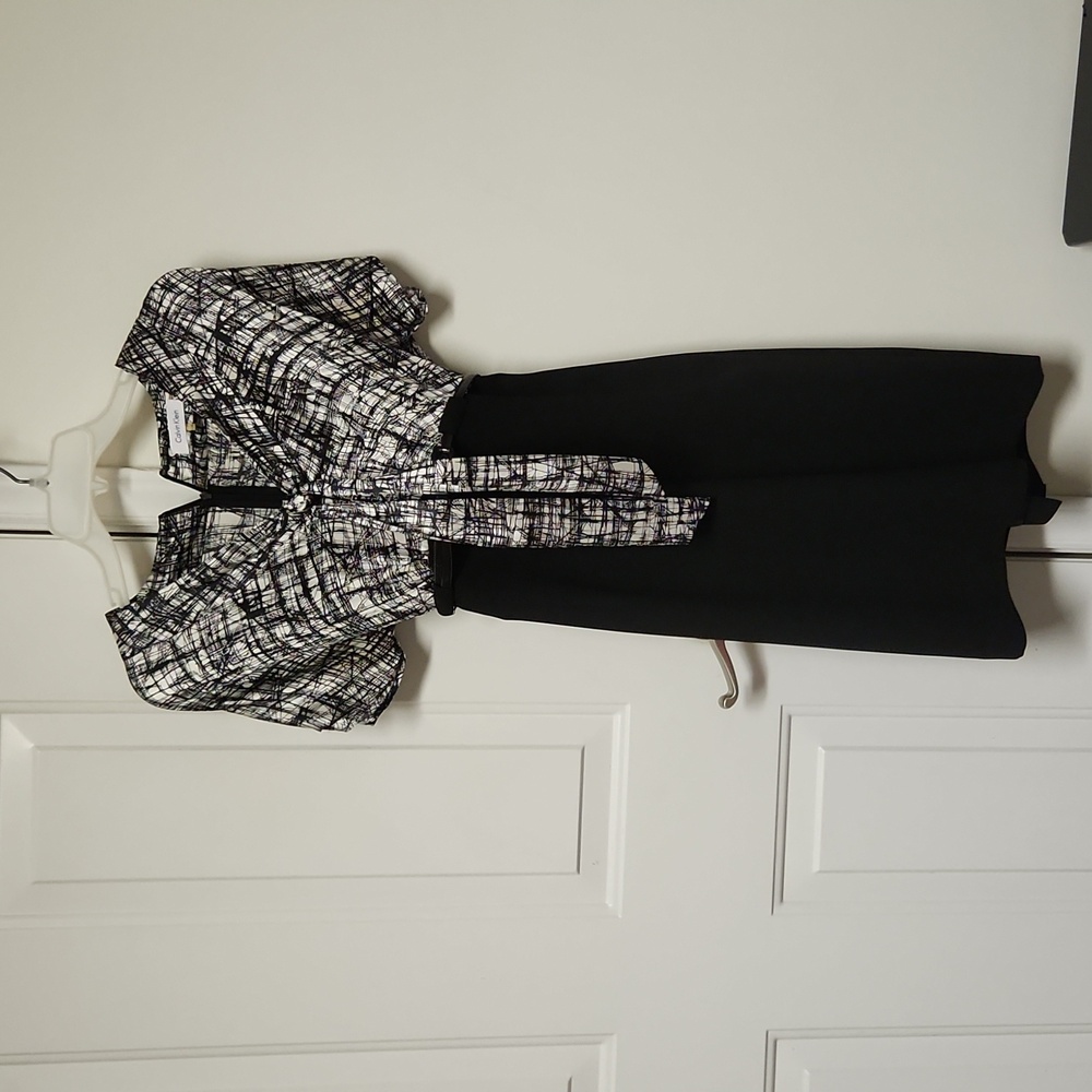 Calvin klein black and white dress with belted waist.